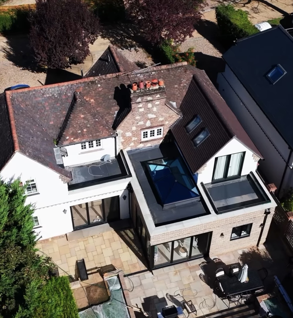 Aerial view of a large house extension and roof renovation